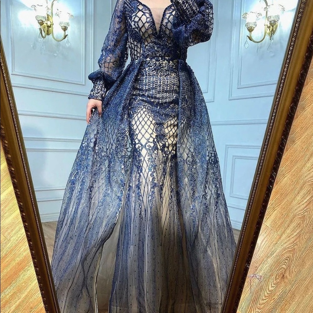 Brand new handmade dress. Mermaid with a train. Never been worn.